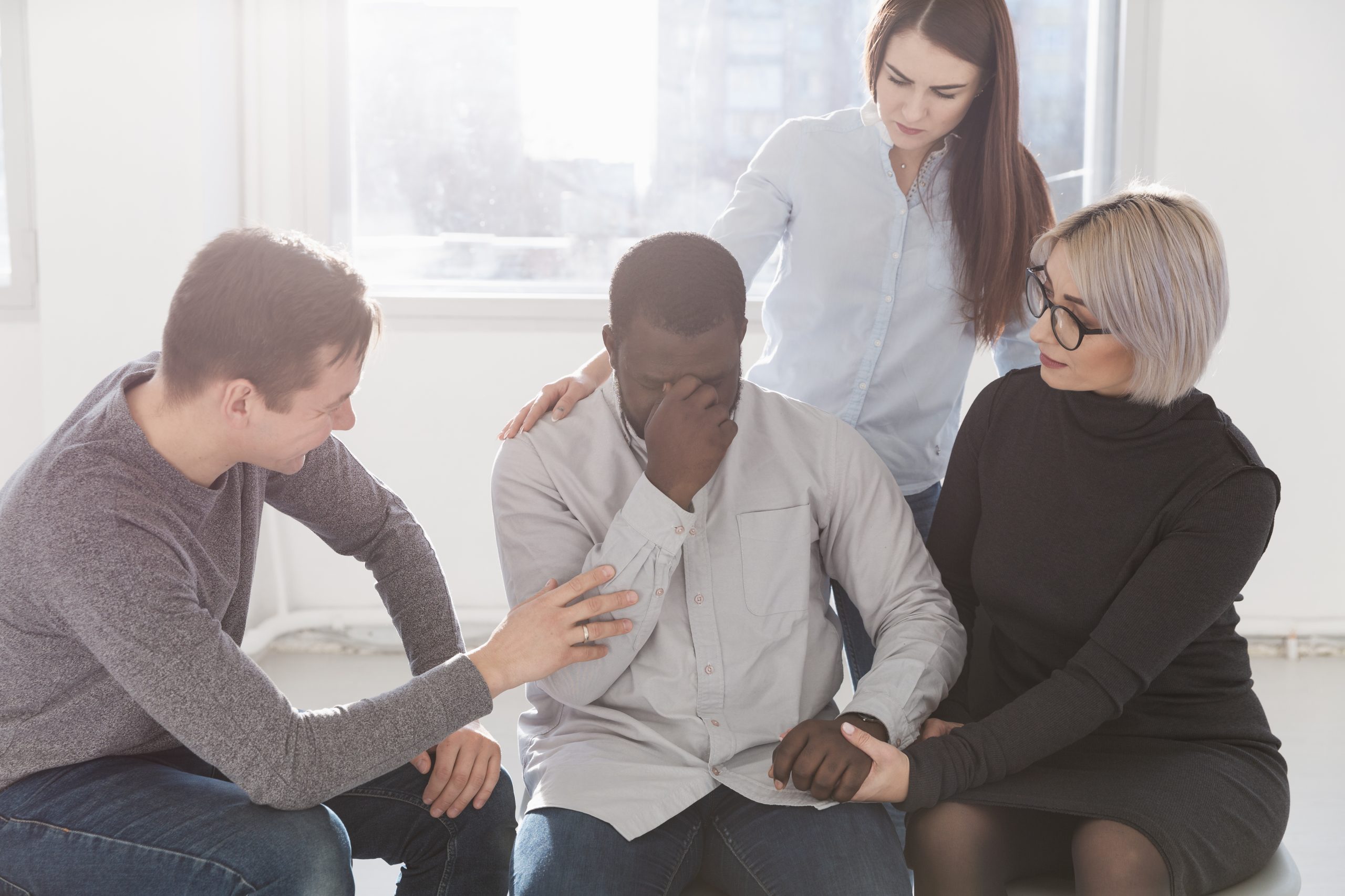 group-friends-encouraging-rehab-patient